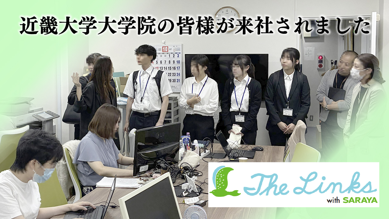 社内を見学される大学院生の様子